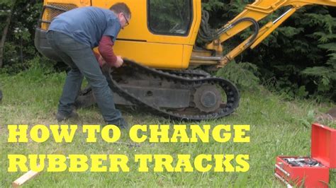 how to change tracks on jcb mini digger|jcb micro digger track tensioner.